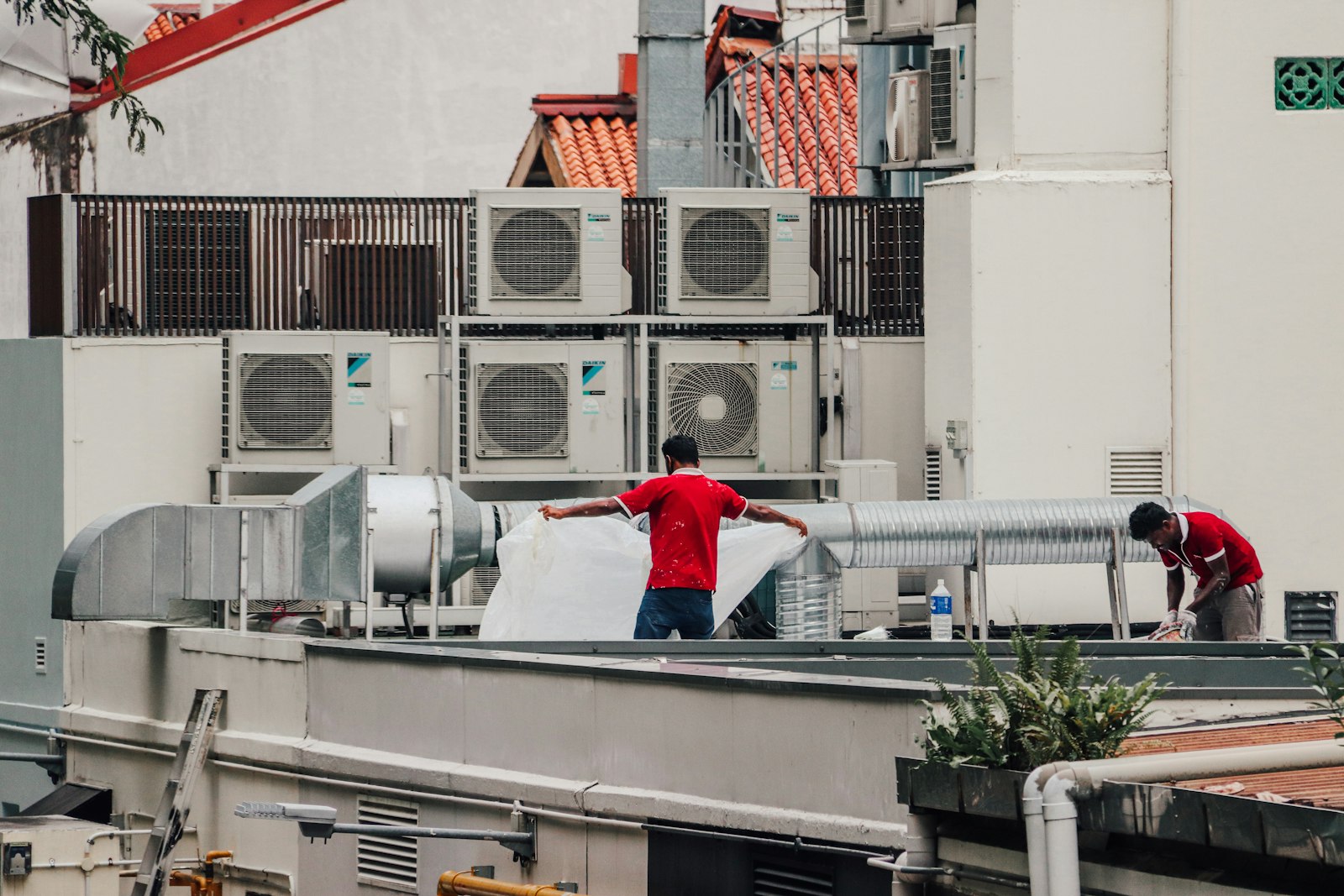 Field service team working on a rooftop installation